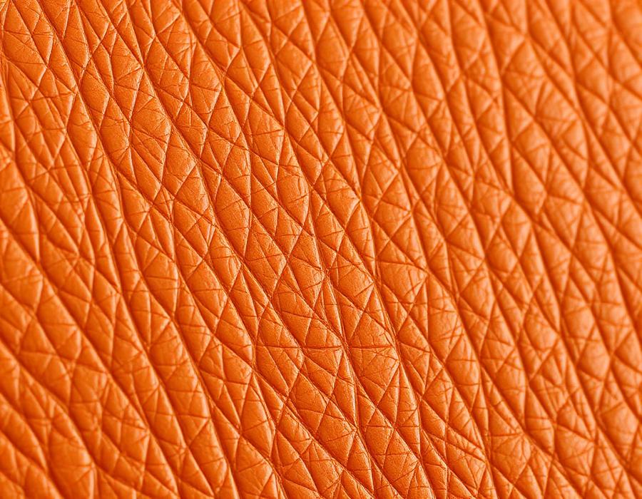 Textura de couro laranja em detalhe macro